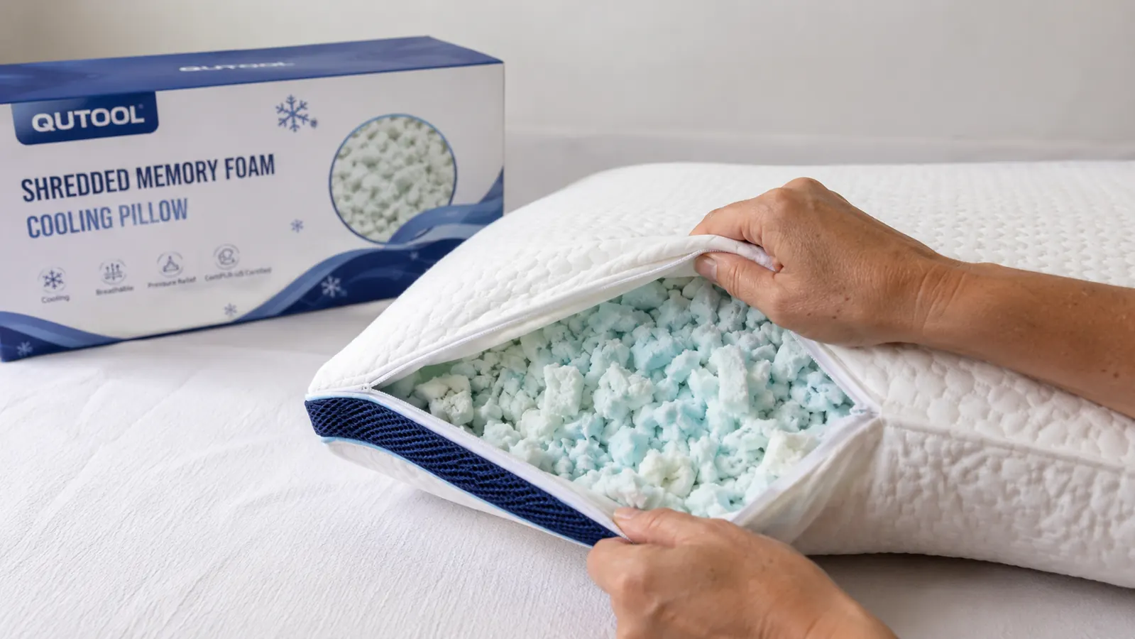 Close-up of shredded memory foam cooling pillow with gel-infused cover, shown with cross-section revealing interior fill